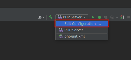 Alt: print de tela do menu principal do Intellij Idea em fundo preto, com a seleção da opção “Edit Configurations” em formato de barra de rolagem e destaque em retângulo vermelho na opção “Edit Configurations” representando as etapas de acesso.