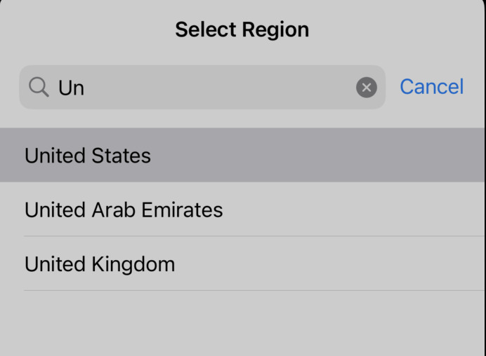 Tela de seleção de região em um dispositivo móvel, mostrando as opções: United States, United Arab Emirates e United Kingdom.